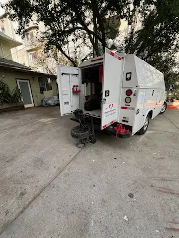 Magnet Plumbing service vehicle on-site for Grease Trap Cleaning in Jacksonville Beach